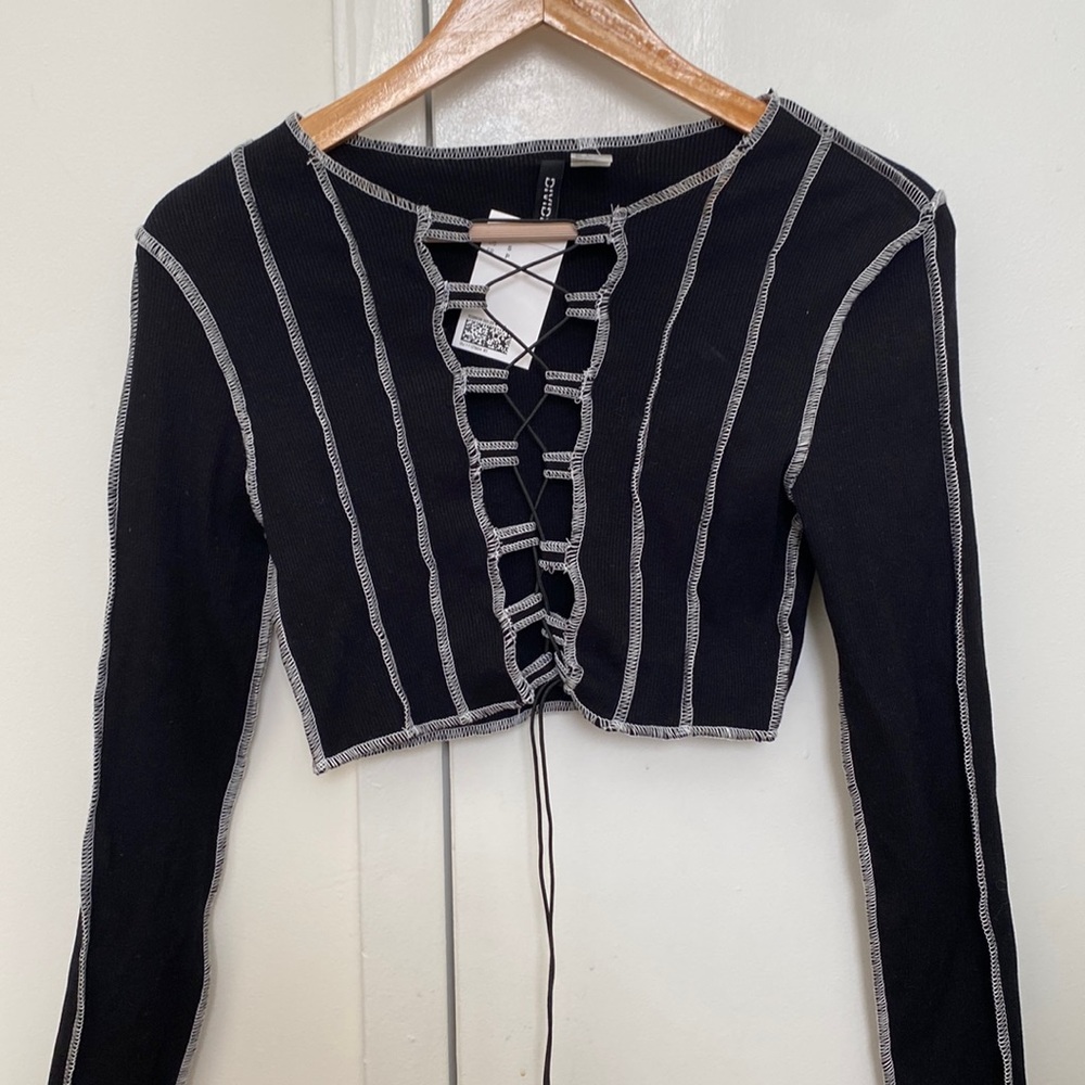 H&M Crisscross lace up long sleeve top. Black and white.